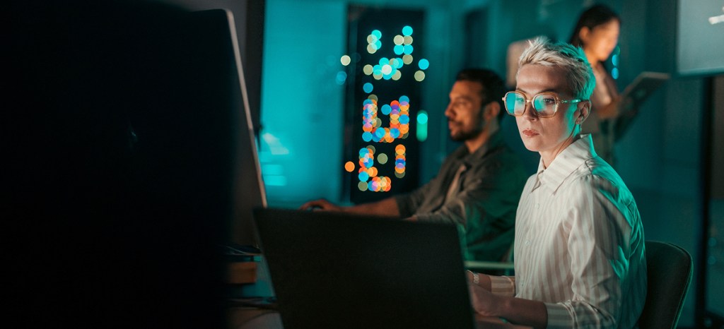 data scientist programming on computer
